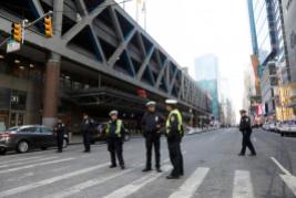 Police officers stand outside the New York Port Authority Bus Terminal. REUTERS/Brendan McDermid